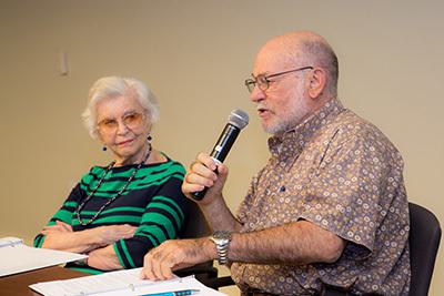 Old man talking in the microphone